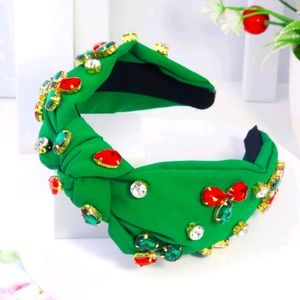Green headband with knot design with stones